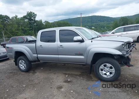 2014 Toyota Tacoma Base V6 z USA, uszkodzony, nr VIN 3TMMU4FN9EM064381